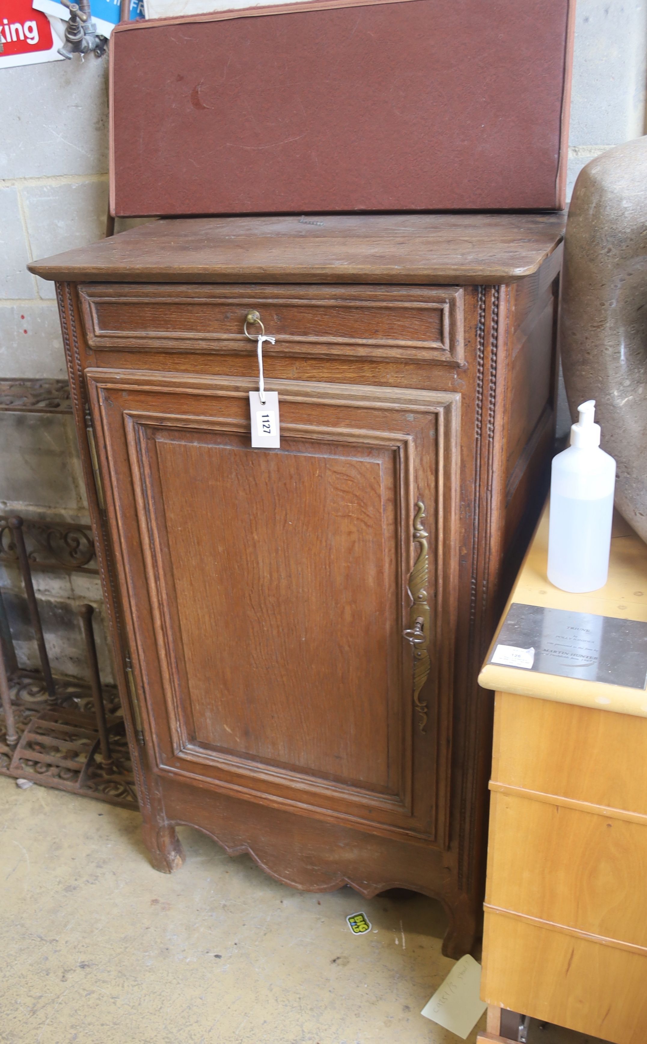 A 19th century Normandy oak side cabinet, width 66cm, depth 49cm, height 109cm